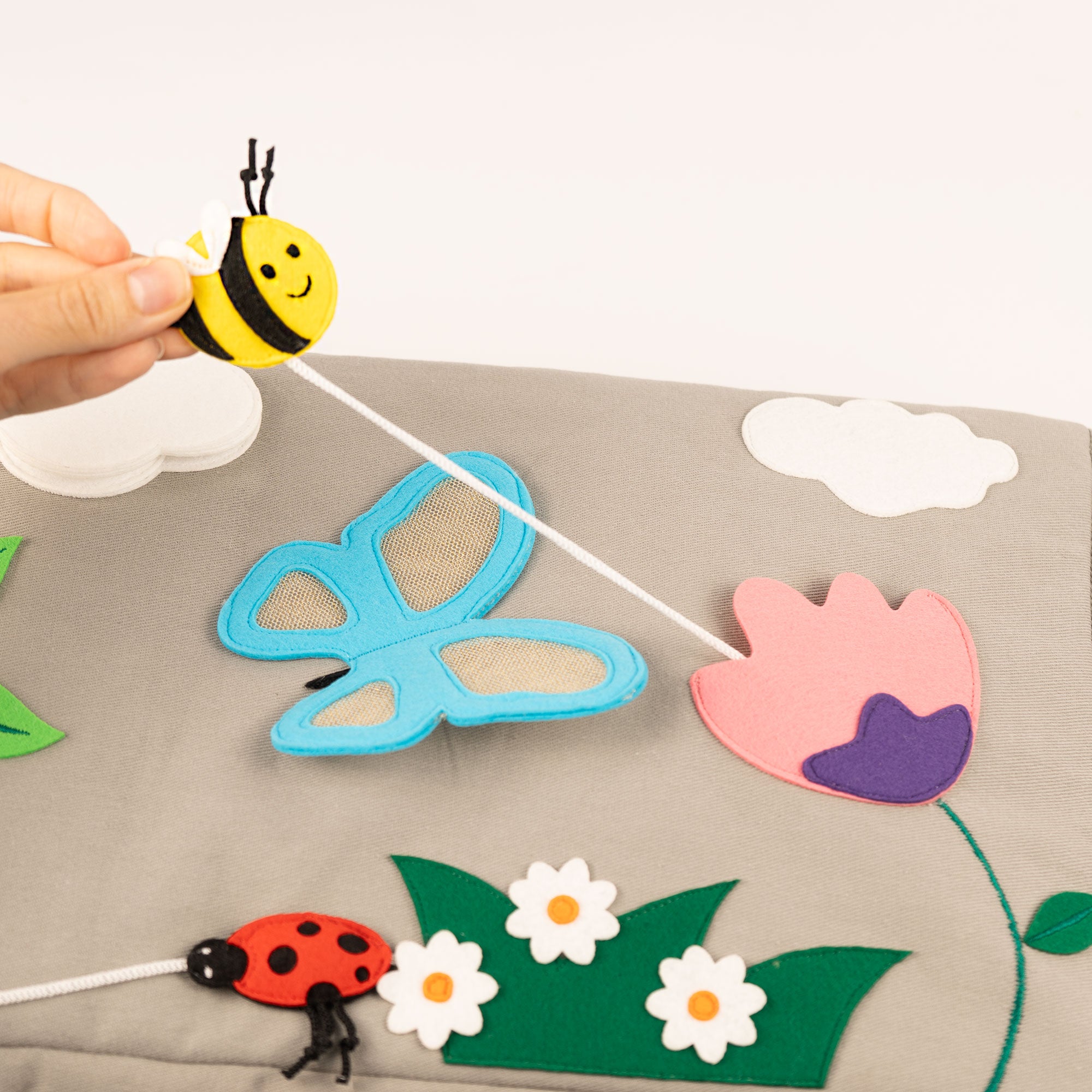 Activity cushions bee and butterfly
