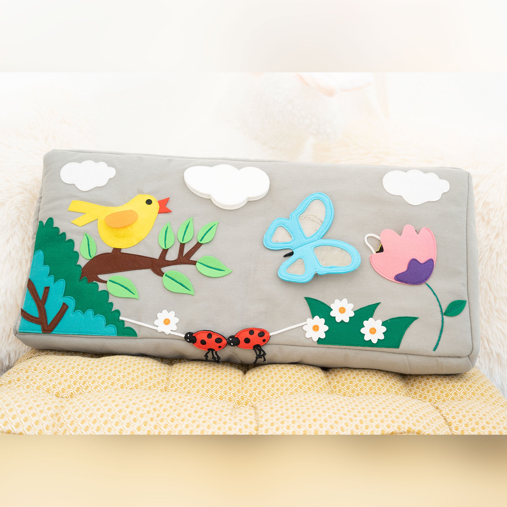 Activity cushions bee and butterfly
